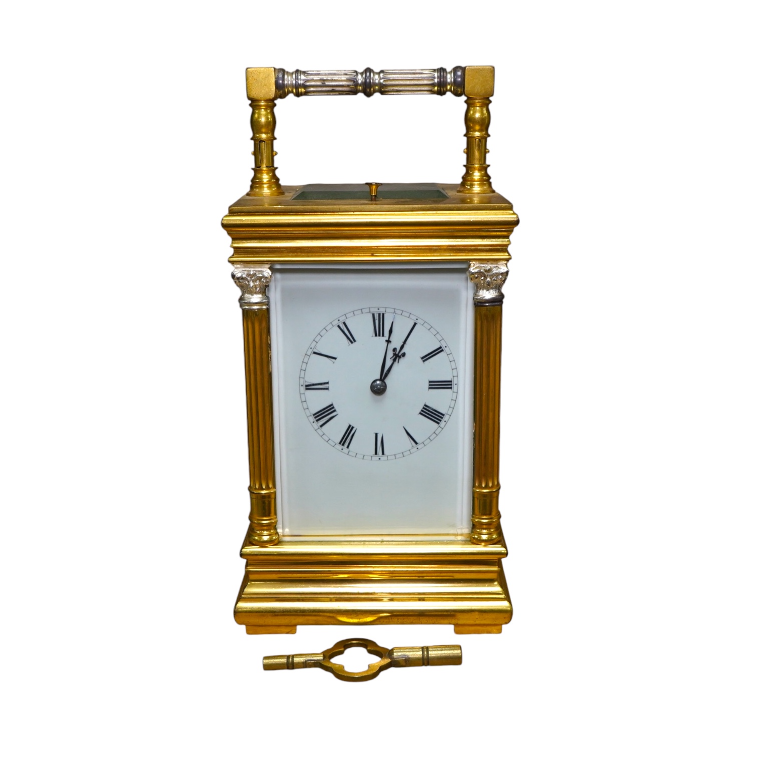 A French silvered and gilt brass hour repeating carriage clock with enamel dial, with key, 20cm high. Condition - good, untested